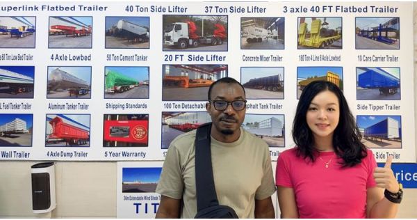 Cliente de Angola visita TITAN para comprar remolque de plataforma baja de tres ejes