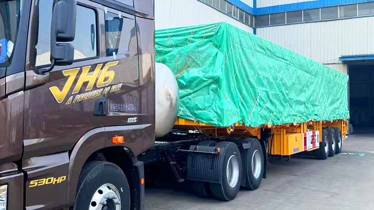 Camión con plataforma de 3 ejes en venta en Zambia
