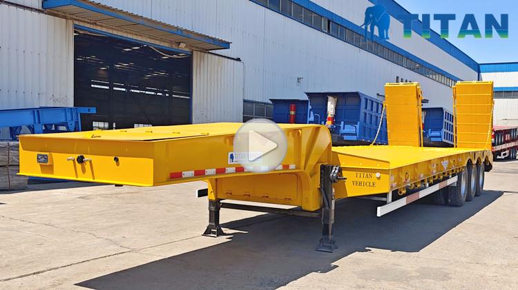 Cliente de Angola visita TITAN para comprar remolque de plataforma baja de tres ejes