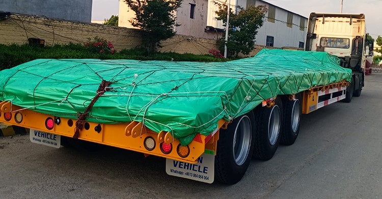 Remolque de plataforma baja de 3 ejes y 60 toneladas en venta en Uganda