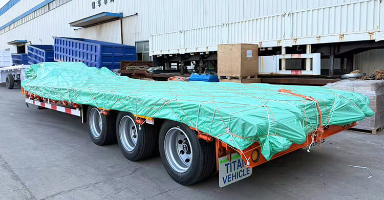Remolque de plataforma baja de 60 toneladas y 3 ejes en venta en Nigeria