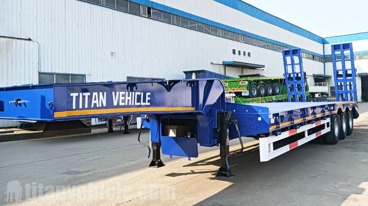 Semirremolque de plataforma baja de 3 ejes en venta en Angola