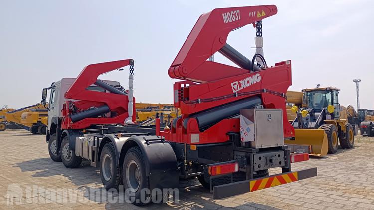 Camión portacontenedores de 20 pies con carga lateral en venta en Chile