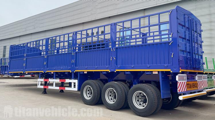 Cliente de Mozambique visita TITAN para comprar un semirremolque de carga con valla.