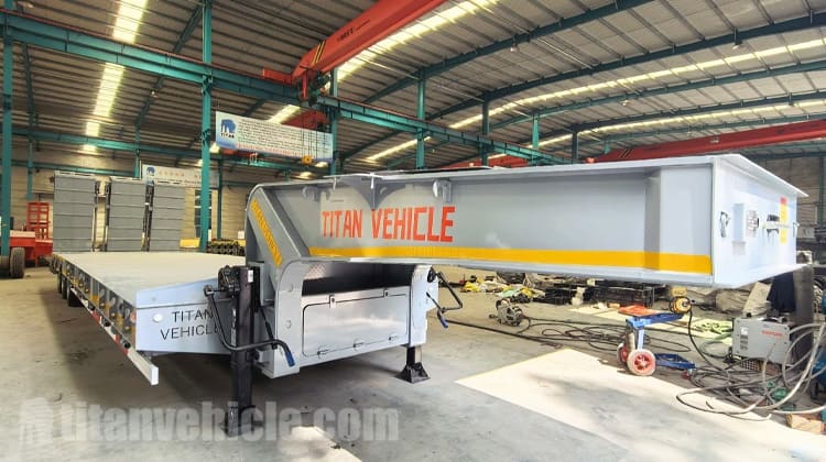 Remolque hidráulico de plataforma baja de tres ejes en venta en Nigeria