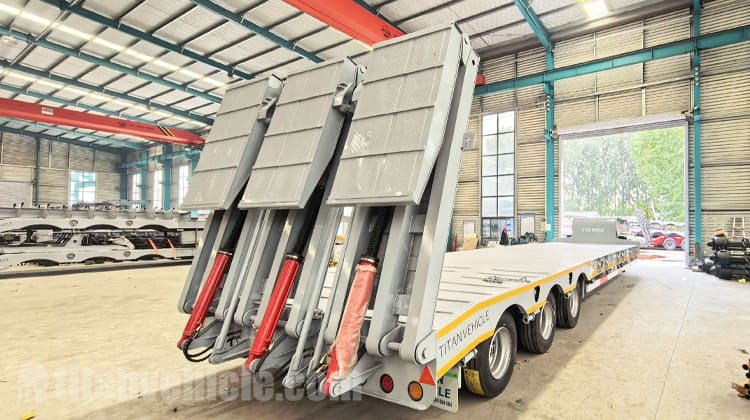 Remolque hidráulico de plataforma baja de tres ejes en venta en Nigeria