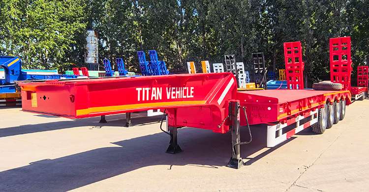 Remolque de plataforma baja de 4 ejes y 100 toneladas en venta en Ghana.