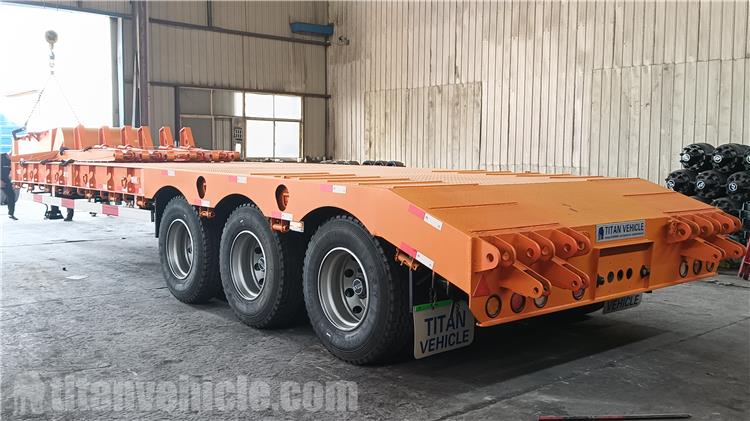 Remolque de plataforma baja de tres ejes y 60 tonos a la venta en Indonesia